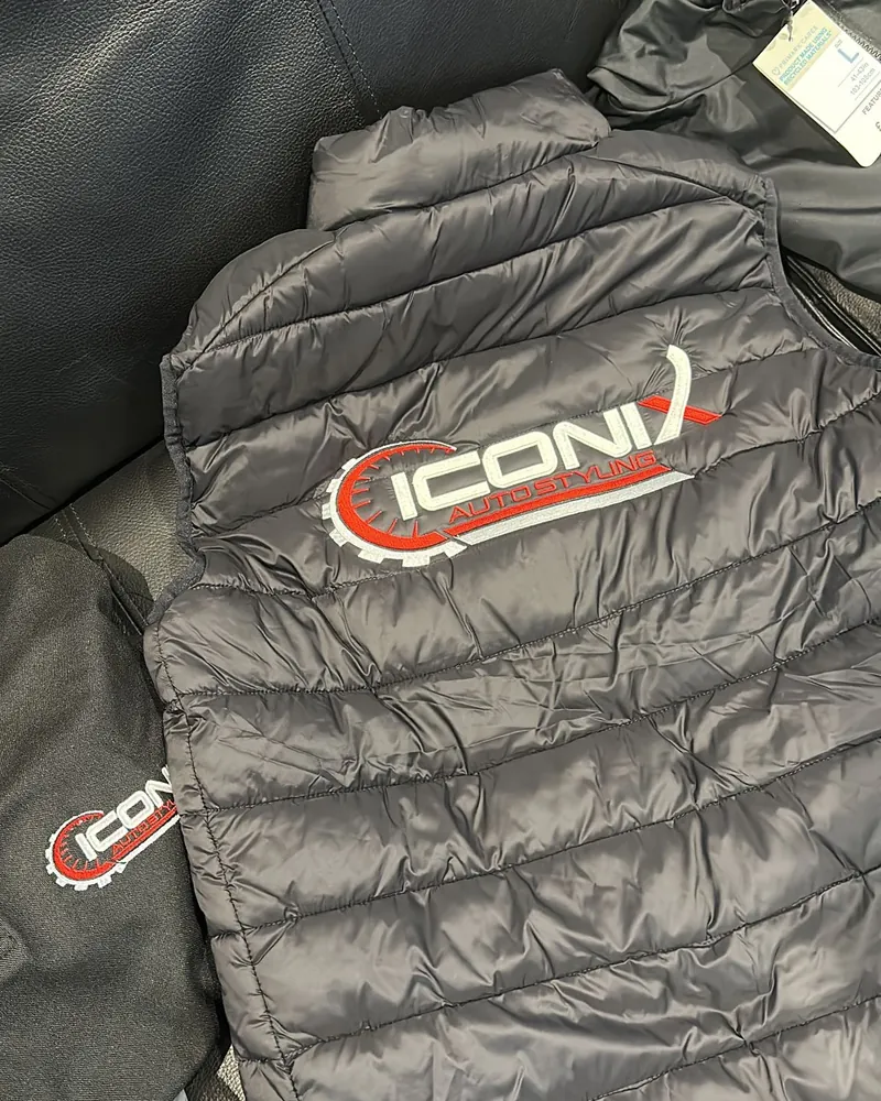 Iconix body warmer with logo, laid flat