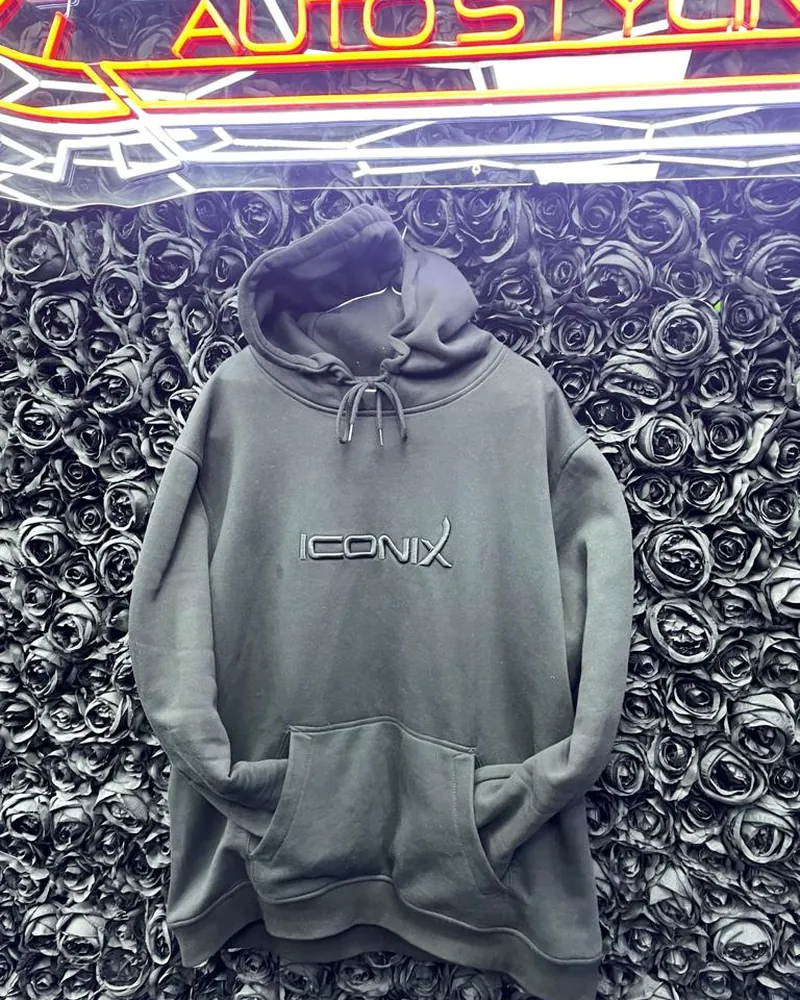 Iconix hoodie with black logo hung up