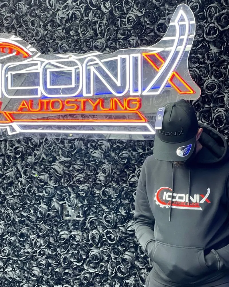 Iconix hoodie with white logo, worn in the Iconix studio