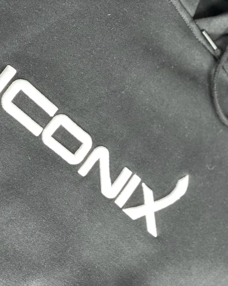 Close-up of the white Iconix logo on the hoodie